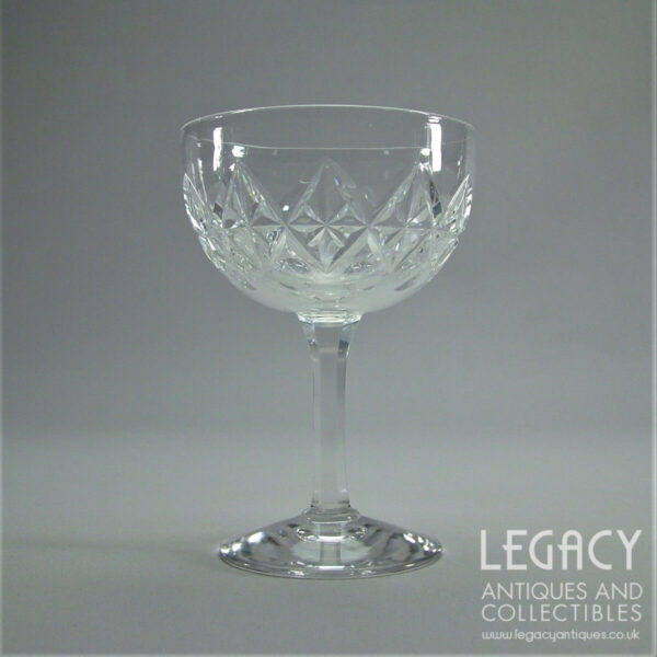 Pair of Stuart Crystal High-Quality Star and Lens Cut Lead Crystal Champagne Glasses c.1920s